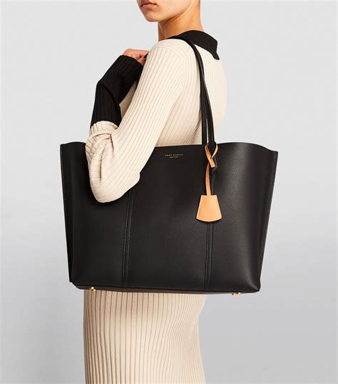 tory burch black leather tote.